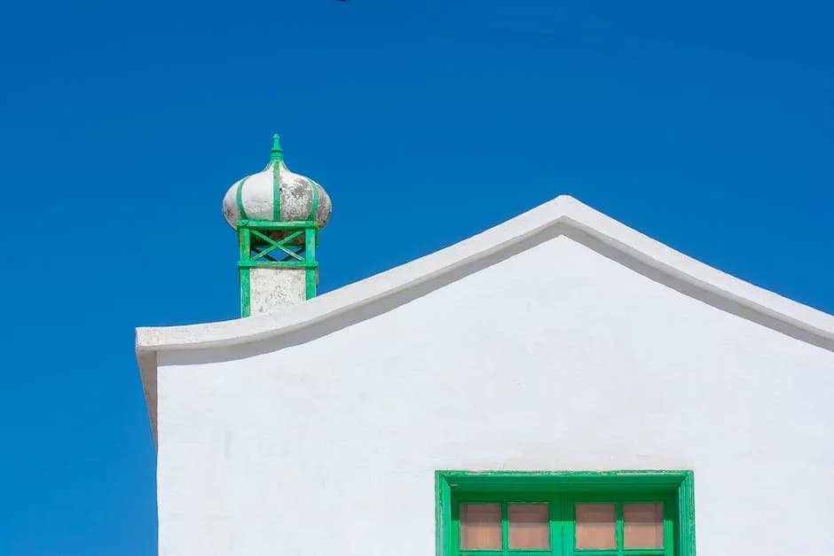 Whitewashed houses with blue trim in Monsaraz, one of Portugal's most colorful towns